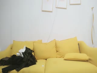 A plump young woman in a black coat with open crotch, black stockings and high heels gives a blowjob in the 69 position. She is being fucked and is breathing rapidly, shouting that it feels so good.