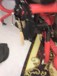 The couple master and slave have an open crotch black silk pussy on the octopus chair, let the boy lick it like a dog, lick it wet and then fuck it, the high-heeled black silk queen wears a fake cock and panties to fuck