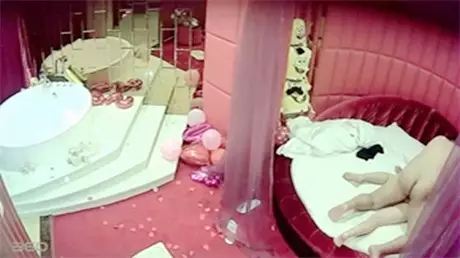 The fat guy who just finished a party is really good at playing and lets his girlfriend ride on him in a school uniform