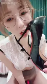 A beautiful young woman with glasses and a charming appearance, with a slim figure and long legs, has a good sex life and a desire to conquer